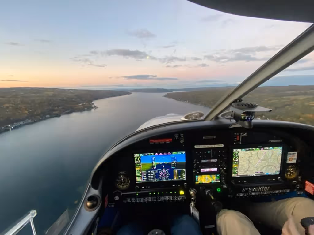 A small plane flying over Niagara Falls
