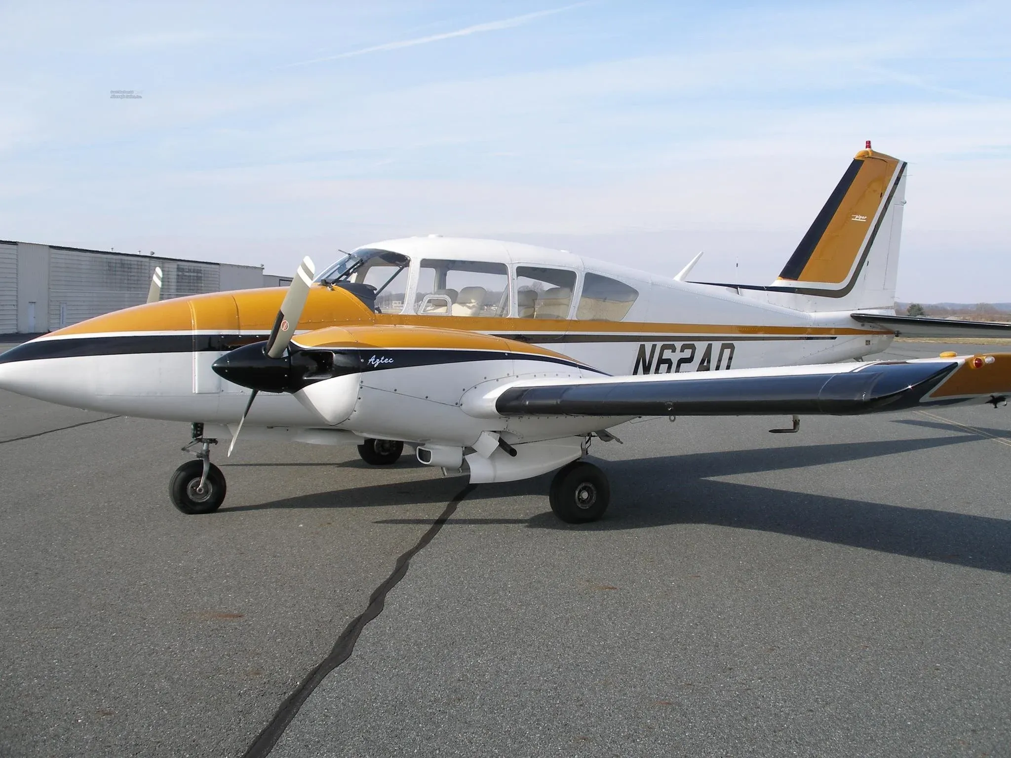 Hawkins Flight Academy Piper Aztec N62AD on the ramp in Shelbyville.