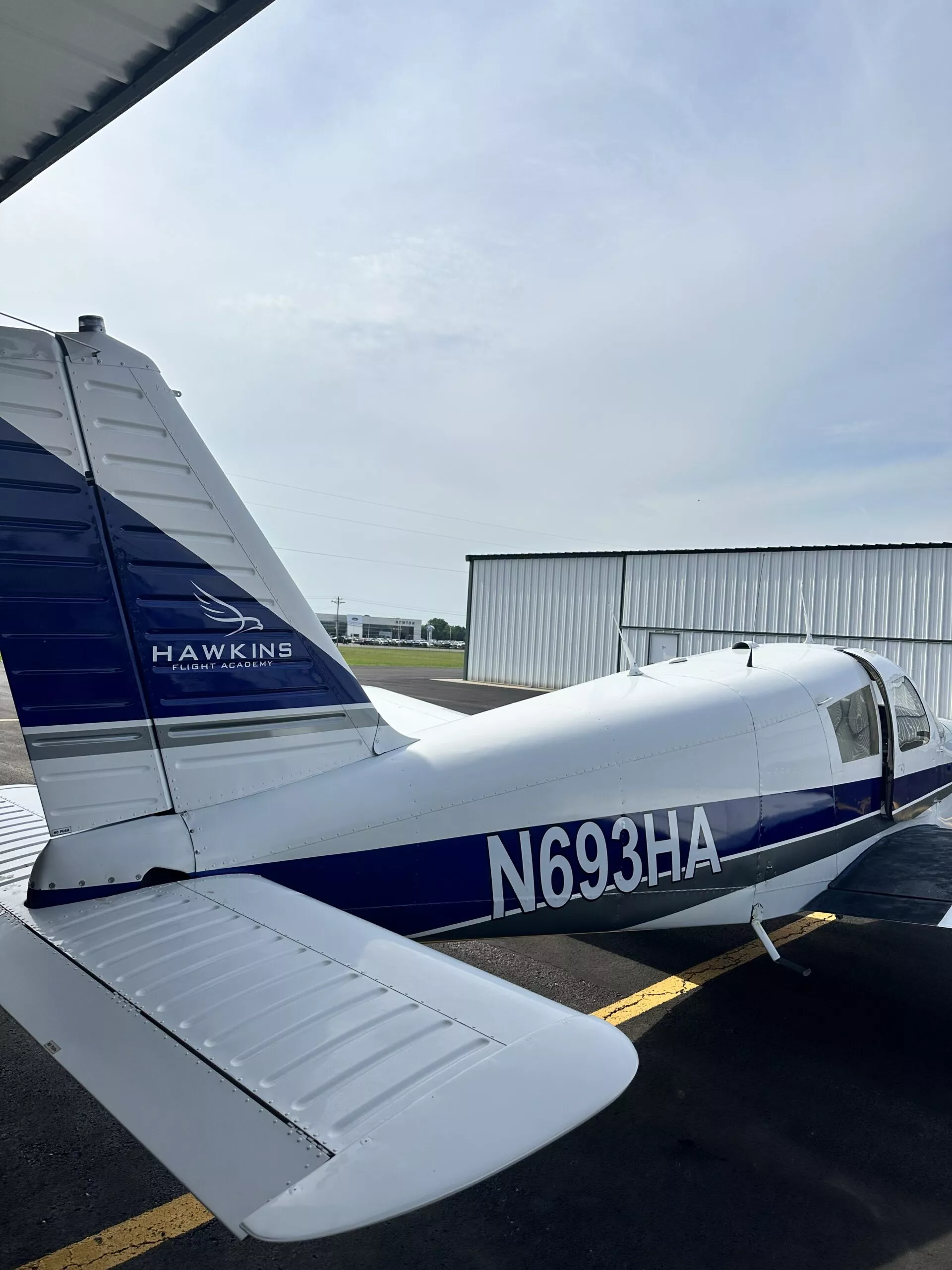 Hawkins Flight Academy Piper Cherokee 140 N693HA on the ramp