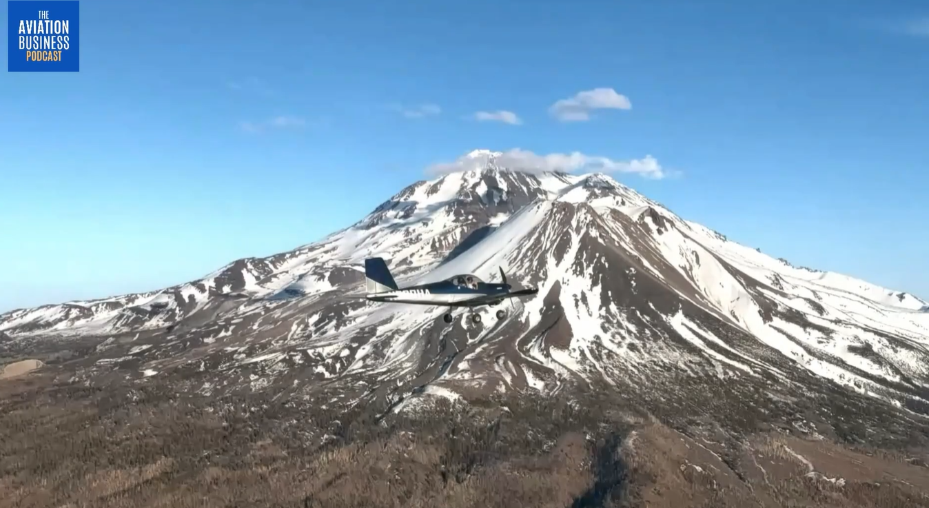 Screenshot of our RV-12 aircraft flying near mountains shown during the podcast
